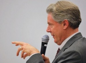 Congressman Frank Pallone  moving his lips, and fingers