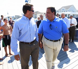 Belmar Mayor Matt Doherty, left, and Governor Chris Christie, on the Belmar boardwalk last summer.  Freeholder Director John Curley, the the background, right, will not be challenged by Doherty this November.