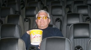 Atlantic Cinemas owner tests his new seats.